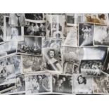 A large selection of mixed black/white film and publicity stills covering a wide range of films