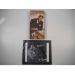 A mounted 10”x8” B&W photo boldly signed by FATS DOMINO with COA from Autograph Store USA plus a