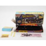 A CORGI Toys 267 Batmobile - first version with gloss black body , pulsating exhaust flame and no