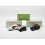 A trio of hand built white metal models by MODEL ROAD REPLICAS (SMTS), comprising a black Austin