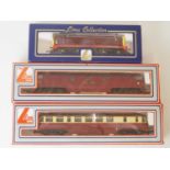 A group of LIMA OO gauge diesel locomotives, comprising a Western Class in BR maroon, an ex GWR