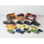 A group of boxed and unboxed mixed scale Taxis to include CORGI, DINKY, BUDGIE and TRI-ANG (