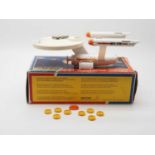 A DINKY 358 'Star Trek' USS Enterprise, white, orange with 7 x yellow plastic missiles and orange