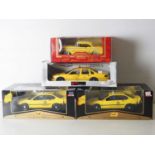 A group of 1:18 scale diecast model US Taxi Cabs by MAISTO, MIRA and UT MODELS - VG/E in G/VG