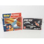 A pair of Star Trek related toys comprising a DINKY 357 Klingon Battle Cruiser complete with a bag