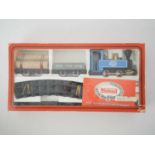 A MAMOD live steam 32mm scale RS2 Goods Train set comprising 0-4-0 steam tank locomotive in pale