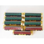 A group of TRI-ANG (TRIANG) TT Gauge Suburban passenger coaches, in BR maroon and green liveries -
