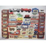 A large quantity of boxed and unboxed diecast lorries, buses etc by MATCHBOX, DINKY and others - G/