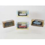 A group of four 1:43 scale diecast cars by NOREV and SE MODELL to include various versions of