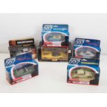 A group of mixed scale diecast by MAISTO and CORGI to include assorted James Bond cars - VG/E in G/