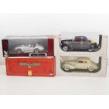 A group of 1:18 scale diecast cars, comprising a ROAD SIGNATURE Shelby Cobra, a SIGNATURE MODELS