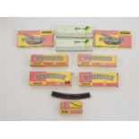 A quantity of boxed and unboxed TRIX EXPRESS HO Gauge 3-rail track and points, boxes not checked for