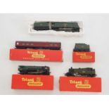 A group of boxed and unboxed OO gauge TR-ANG (TRIANG) steam locomotives and a carriage, comprising