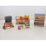 A group of assorted diecast by DINKY and MATCHBOX and an empty box - comprising a Dinky No 571 Coles