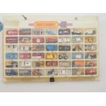 A selection of mid 1970s/early 1980s Matchbox Superfast cars contained in a Matchbox 42 space