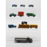 A group of mostly unboxed OO gauge DINKY DUBLO, comprising x4 069 Massey Harris tractors, an 063