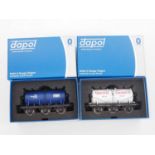 A pair of DAPOL O gauge tank wagons, comprising of a 7F-031-003 six wheel milk tanker 'Milk