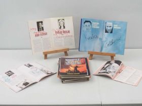 A group of 31 signed theatre programmes, most of which have multiple autographs (dedicated) - to