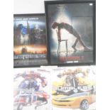 A group of framed and glazed posters comprising: DEADPOOL one sheet andTRANSFORMERS UK Quad film