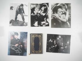 WHERE EAGLES DARE (1968) - A signed photograph, 4 x black/white publicity stills and a hard back