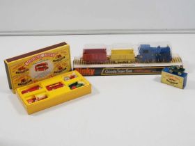 A DINKY 784 Goods Train Set together with a reproduction MATCHBOX Set and Land Rover - VG/E in G/