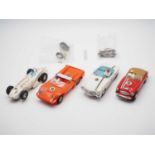 A group of unboxed 1960s/70s SCALEXTRIC cars together with spare motor and axle - G (unboxed) (6)