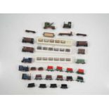 A group of boxed and unboxed OO9 / HOe scale locomotives and rolling stock, both kitbuilt and RTR,