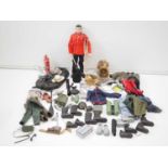 A group of unboxed ACTION MAN accessories including clothing, gun, dinghy, fire extinguisher etc