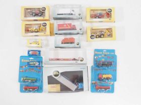 A group of 1:76 scale diecast lorries and construction equipment by OXFORD DIECAST and BASE TOYS -