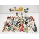 A large quantity of mostly vintage late 1970s early 1980s unboxed STAR WARS figures together with