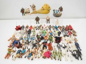 A large quantity of mostly vintage late 1970s early 1980s unboxed STAR WARS figures together with