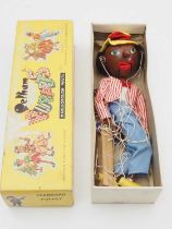 A vintage PELHAM PUPPET SM Singing Minstrel (without Banjo) in yellow snake charmer box - G in F/G