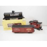 A group of G scale wagons comprising a boxed ARISTOCRAFT Mobilgas tank wagon, Florence & Cripple