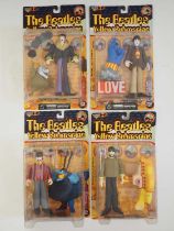 A complete set of four MCFARLANE 'The Beatles - Yellow Submarine' figures - John, George, Ringo