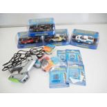 A selection of SCALEXTRIC cars, controllers (unboxed) with separate colour coded clips, 2 x