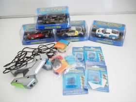 A selection of SCALEXTRIC cars, controllers (unboxed) with separate colour coded clips, 2 x