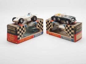 A pair of vintage 1960a SCALEXTRIC racing cars comprising C79 Offenhauser Front Engine together with