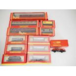 A mixed group of HORNBY OO gauge rolling stock including a factory sealed R6102 MGR hopper wagon