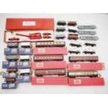 A large quantity of boxed and unboxed HORNBY DUBLO OO gauge 2 and 3-rail wagons and coaches - G/VG