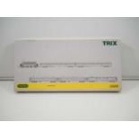 A TRIX N gauge 11600 German outline Fast Passenger train pack comprising BR144 electric locomotive