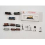 A group of unboxed N gauge locomotives, rolling stock and accessories by FARISH, MINITRIX and others