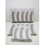 A group of KATO N gauge Unitrack double track elevated curve sections comprising 3 packs of 20-