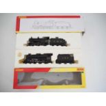 A pair of HORNBY OO gauge steam locomotives in LMS black livery comprising R2193 Class 4F Fowler and