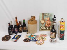 A collection of vintage international and commemorative Breweriana including: beer, bottles and