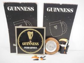 GUINNESS interior decorations comprising small flying toucan (Carlton Ware), reproduction plaque,