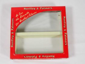 A miniature Huntley & Palmers Biscuit tin, shop display cabinet, 23.5cm x 22cm
