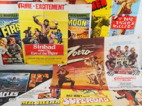 A large group of Adventure and Action film UK Quad double bill film posters to include: