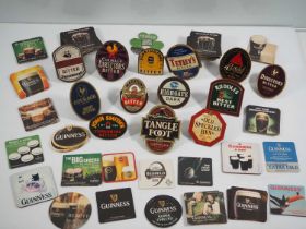 A collection of Pump Clips including; Tetley's Bitter, Old Speckled Hen, Directors Bitter,