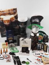 A collection of Guinness and related advertising collectables including a Guinness calendar,