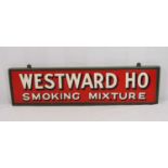 A Mid-20th century Advertising Sign for 'Westward Ho Smoking Mixture', painted tin in wooden hanging